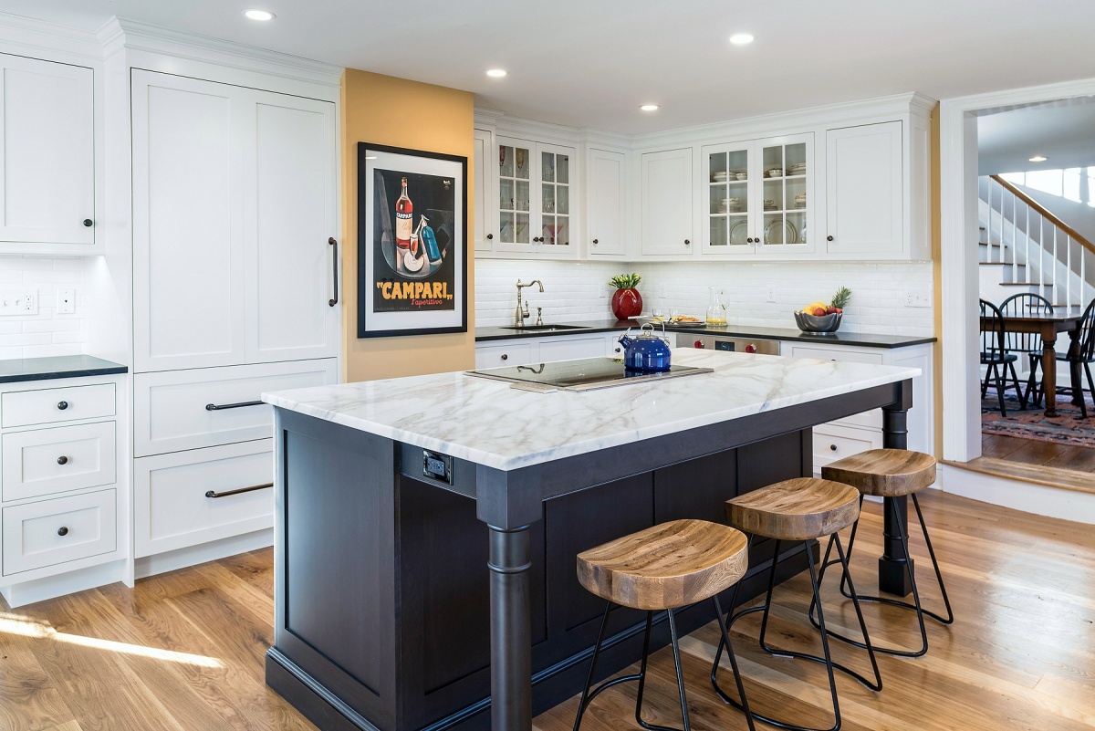 marble countertop and wood floor kitchen