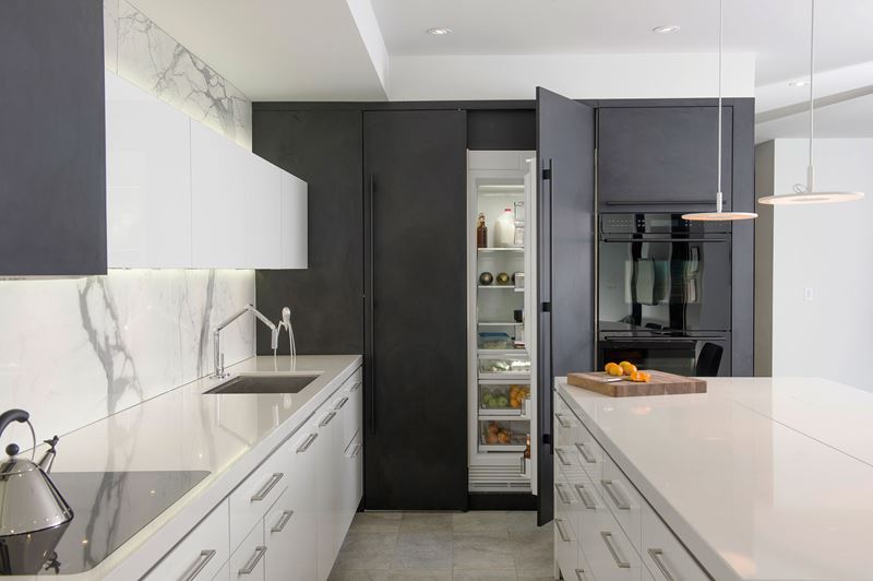 white kitchen with matte grey fridge